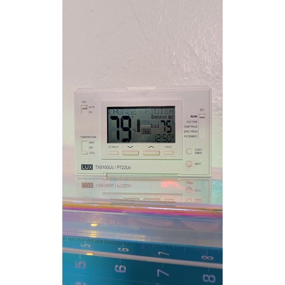 Pre-owned LUX TX9100Uc / P722Uc programmable digital thermostat in working